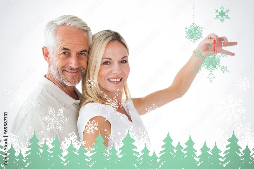 Aufkleber composite image of happy couple showing their new house key