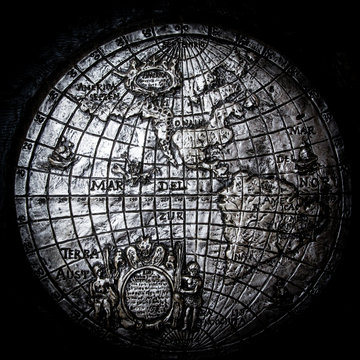 The ancient metallic plaque depict the map of the world