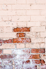 Vertical old red brick wall texture half painted