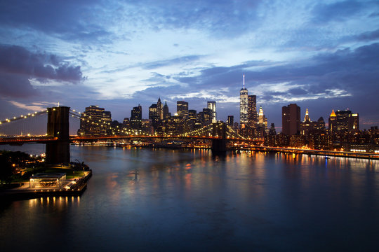 Fototapeta New York City Manhattan Downtown with Brooklyn Bridge at dusk