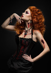 Gothic redhead beauty  with wounds