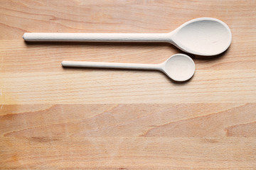 wooden cutlery on cutting board