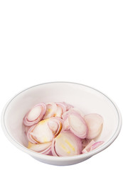 Chopped onions in a bowl over white background