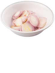 Chopped onions in a bowl over white background