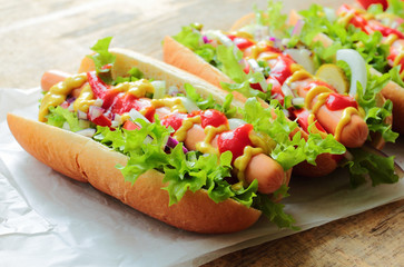 Hot dogs with fresh sausage and vegetables
