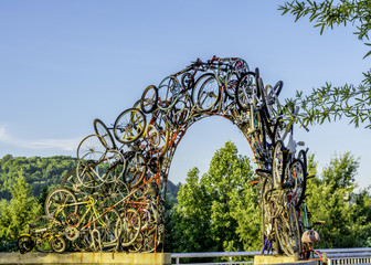Unique arch made of bicycles along the Tennessee River - obrazy, fototapety, plakaty