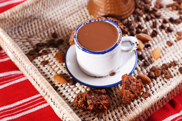 Cup of hot chocolate on table, close up