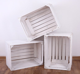Empty wooden crates in room