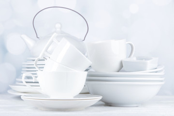 White crockery and kitchen utensils,