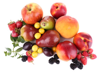 Different berries and fruits isolated on white