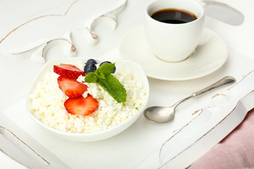Delicious breakfast with coffee and cottage cheese