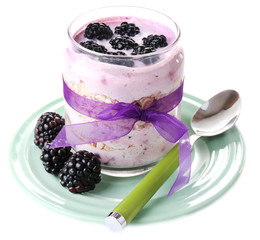 Healthy breakfast - yogurt with  blackberries and muesli served