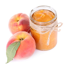 tasty peach jam with fresh peaches, isolated on white