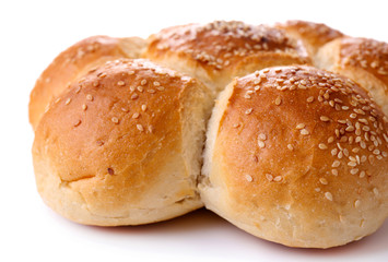 Tasty buns with sesame isolated on white