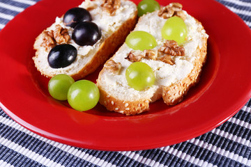 tasty bread with grape and cheese, close up