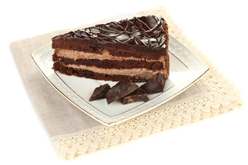 Chocolate cake on plate isolated on white