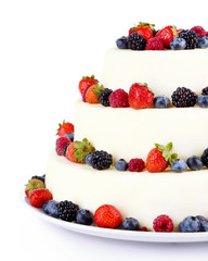 Beautiful wedding cake with berries, isolated on white