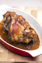 marinated, cooked and slowly baked pork knee