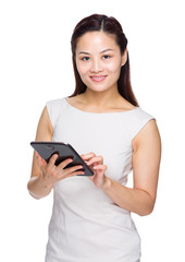 Asian woman hold tablet