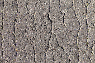 Cracked asphalt.