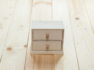 drawers on wooden background