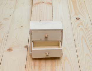 drawers on wooden background