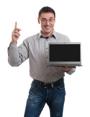 confident young man advertising laptop