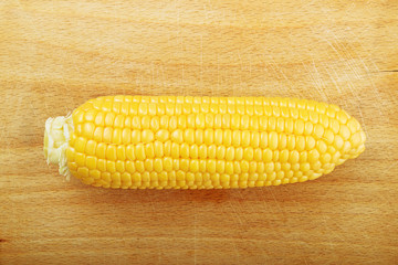 Corn Maize Cob on wooden background