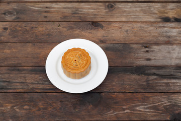Moon Cake close up on old wood table , Chinese Culture