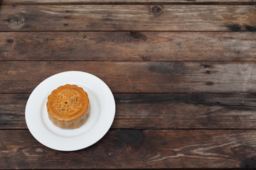 Moon Cake close up on old wood table , Chinese Culture
