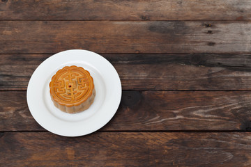 Moon Cake close up on old wood table , Chinese Culture