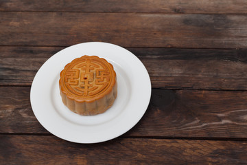 Moon Cake close up on old wood table , Chinese Culture