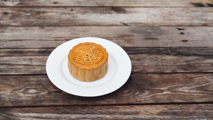 Moon Cake close up on old wood table , Chinese Culture