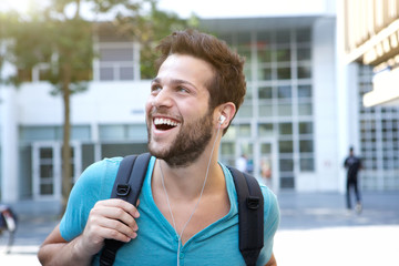 Male college student walking on campus