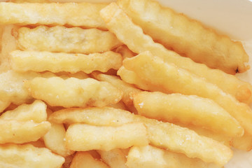 French fries potatoes background.