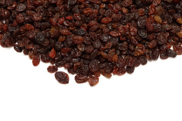Raisins on white background