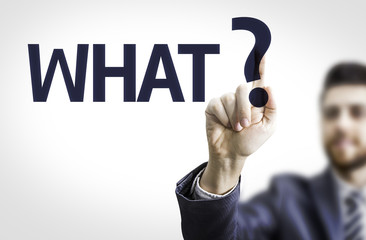 Business man pointing the text: What?