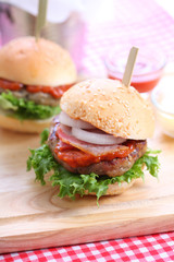 Closeup of homemade hamburger with fresh vegetables