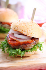 Closeup of homemade hamburger with fresh vegetables