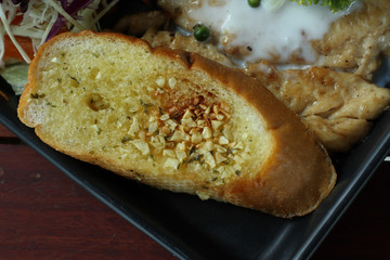 Garlic bread on steak recipe.