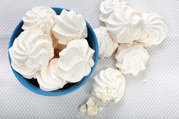 White meringue in a blue bowl