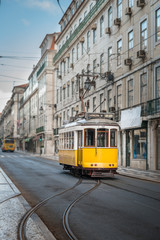 Fototapeta na wymiar Yellow tramway in Lisbon