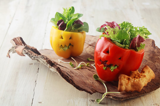 Colorful fresh Halloween bell pepper salads