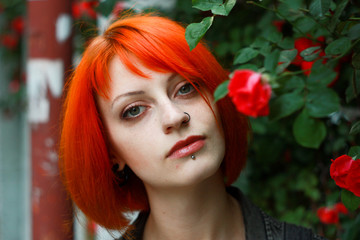 Naklejka premium Red Hair Girl in Rose tree