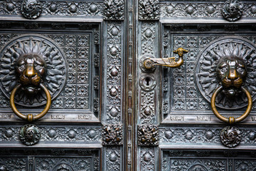 The bronze knocker, gate of the Cologne Cathedral in Germany