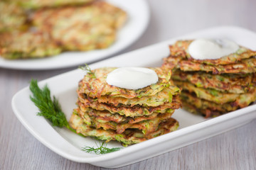 Green pancakes with zucchini and herbs