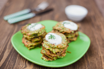 Green pancakes with zucchini and herbs