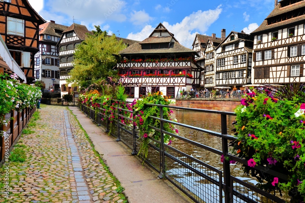 Wall mural quaint timbered houses of petite france, strasbourg, france