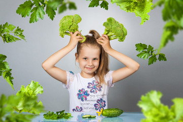 Girl eats vegetables