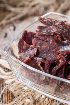 Beef Jerky on wooden background